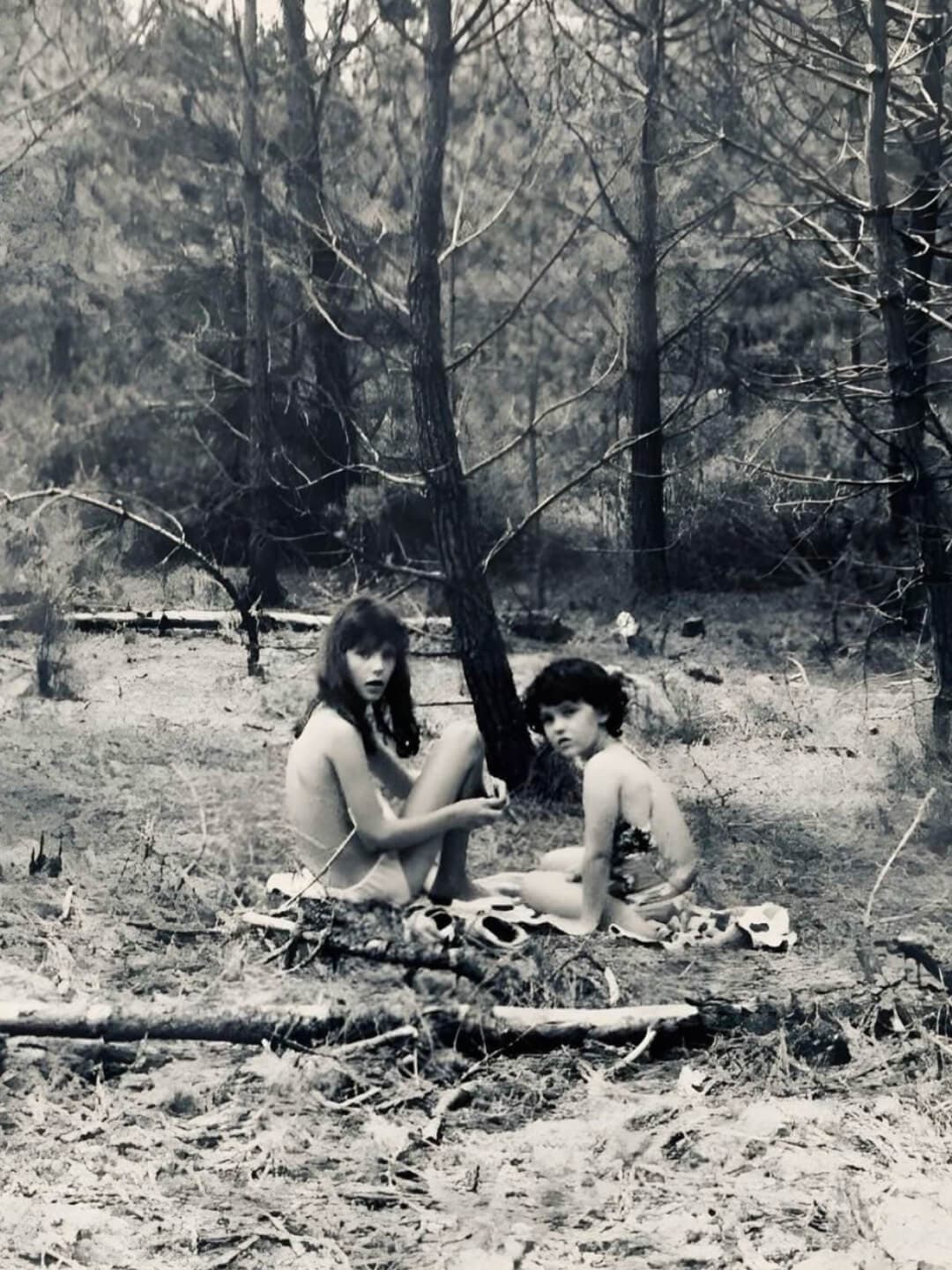 Young Faye (left) and Erica (right) in the forest